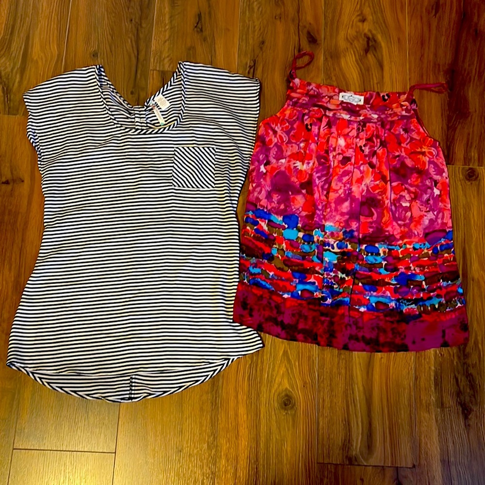 Black and white stripe tee and pink multicolor tank top, both size small